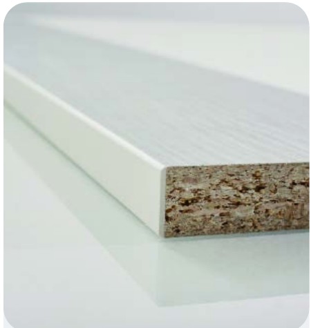 Close-up of a PVC edge band bonded to a particle board panel
